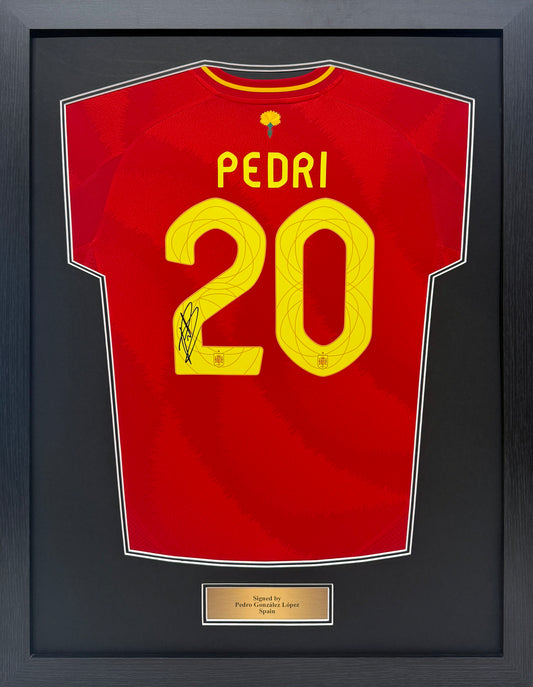 Pedri signed Spain home shirt